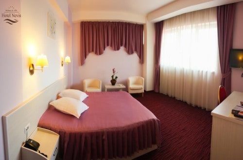 Double room at Nevis Hotel in Oradea, Romania. Travel with World Lifetime Journeys