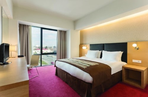 Double room at Ramada Hotel in Oradea, Romania. Travel with World Lifetime Journeys