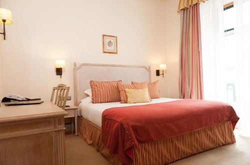 Double room at Real Palácio Hotel in Lisbon, Portugal. Travel with World Lifetime Journeys