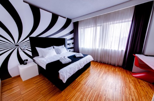 Double room at Sarroglia Hotel in Bucharest, Romania. Travel with World Lifetime Journeys