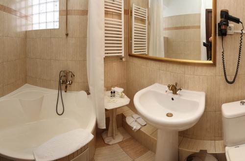 Ensuite bathroom at Arc de Triomphe Hotel in Bucharest, Romania. Travel with World Lifetime Journeys