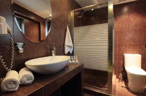 Ensuite bathroom at Athens Lotus Hotel in Athens. Greece. Travel with World Lifetime Journeys