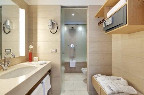 Ensuite bathroom at Barcelo Aran Mantegna Hotel in Rome, Italy. Travel with World Lifetime Journeys