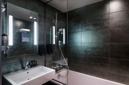 Ensuite bathroom at Clarion Collection Hotel Savoy in Osllo, Norway. Travel with World Lifetime Journeys