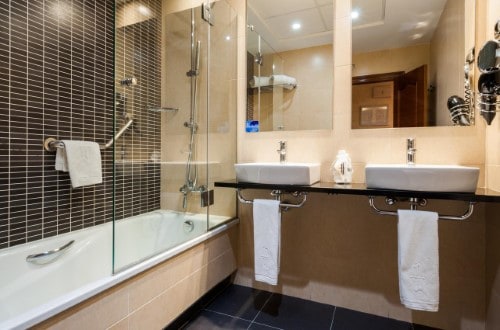 Ensuite bathroom at Hotel Gran Versalles in Madrid, Spain. Travel with World Lifetime Journeys