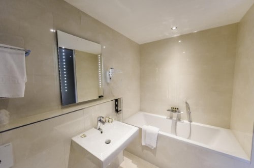 Ensuite bathroom at OZO Hotel Amsterdam in Netherlands. Travel with World Lifetime Journeys