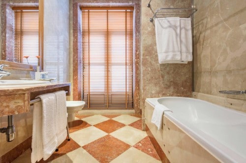 Ensuite bathroom at Real Palácio Hotel in Lisbon, Portugal. Travel with World Lifetime Journeys