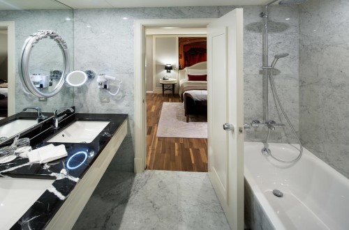 Ensuite bathroom at Titanic Gendarmenmarkt Berlin in Germany. Travel with World Lifetime Journeys