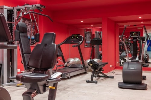 Gym room at Grand Hotel Ritz in Rome, Italy. Travel with World Lifetime Journeys