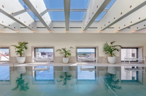 Indoor pool at Barceló Torre de Madrid in Spain. Travel with World Lifetime Journeys