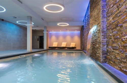 Indoor pool at Corendon City Hotel Amsterdam in Netherlands. Travel with World Lifetime Journeys