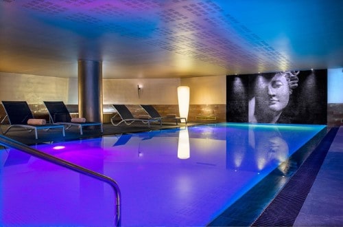 Indoor pool at Dom Pedro Lisboa Hotel in Lisbon, Portugal. Travel with World Lifetime Journeys