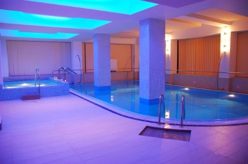 Indoor pool at Nevis Hotel in Oradea, Romania. Travel with World Lifetime Journeys