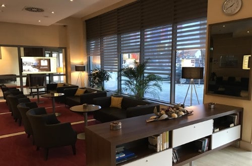 Lounge area at Austria Trend Hotel Ljubljana in Slovenia. Travel with World Lifetime Journeys