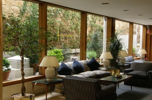 Lounge area at Hotel Gran Versalles in Madrid, Spain. Travel with World Lifetime Journeys