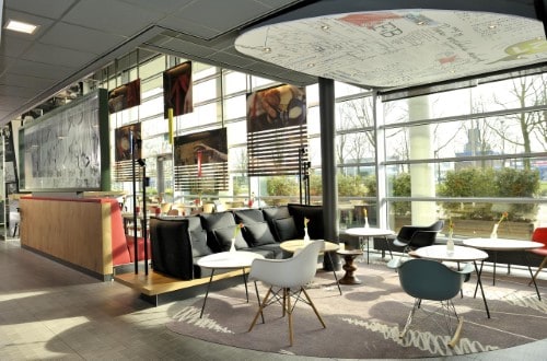 Lounge area at Ibis Amsterdam City West in Netherlands. Travel with World Lifetime Journeys