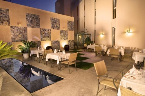 Outdoor terrace at Real Palácio Hotel in Lisbon, Portugal. Travel with World Lifetime Journeys