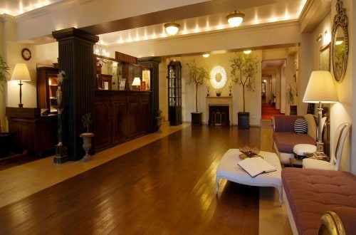 Reception area at Arc de Triomphe Hotel in Bucharest, Romania. Travel with World Lifetime Journeys