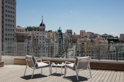 Room terrace at Barceló Torre de Madrid in Spain. Travel with World Lifetime Journeys