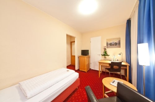 Single room at Novum Hotel Gates Berlin Charlottenburg in Berlin, Germany. Travel with World Lifetime Journeys