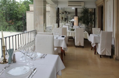 Terrace restaurant at Arc de Triomphe Hotel in Bucharest, Romania. Travel with World Lifetime Journeys