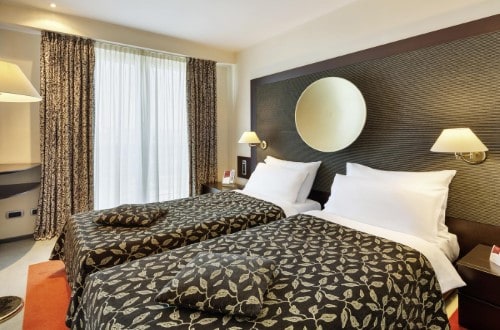 Twin room at Austria Trend Hotel Ljubljana in Slovenia. Travel with World Lifetime Journeys