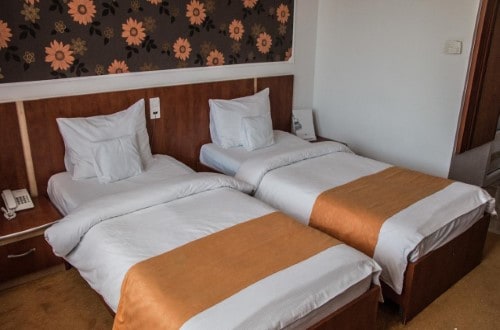 Twin room at Silver Hotel in Oradea, Romania. Travel with World Lifetime Journeys