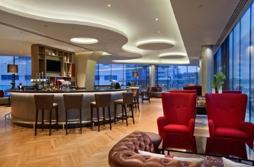 Bar area at Hilton London Wembley in United Kingdom. Travel with World Lifetime Journeys