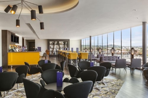 Bar area at Hilton London Wembley in United Kingdom. Travel with World Lifetime Journeys