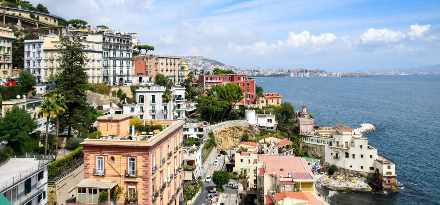 City and sea in Naples, Italy. Travel with World Lifetime Journeys