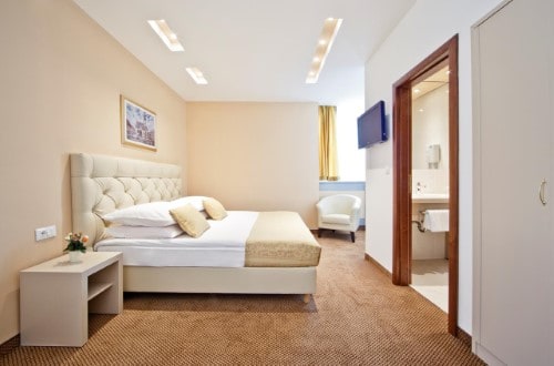 Comfortable room at Hotel Central in Zagreb, Croatia. Travel with World Lifetime Journeys