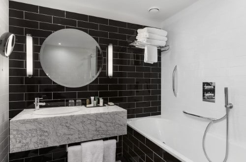 Ensuite bathroom at Hilton London Wembley in United Kingdom. Travel with World Lifetime Journeys