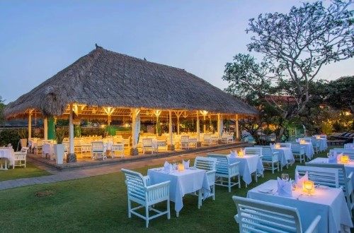 Outside dining at Sol Beach House Benoa. Travel with World Lifetime Journeys in Bali, Indonesia