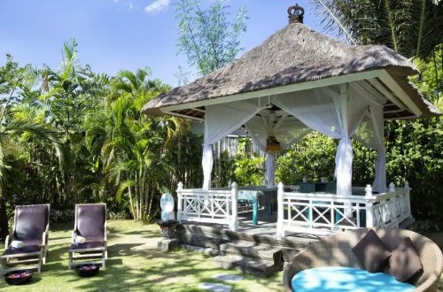 Outside relaxing area at Sol Beach House Benoa. Travel with World Lifetime Journeys in Bali, Indonesia