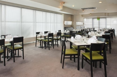 Restaurant at Holiday Inn London Brent Cross in United Kingdom. Travel with World Lifetime Journeys