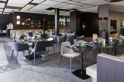 Restaurant area at Novotel Bern Expo in Bern, Switzerland. Travel with World Lifetime Journeys