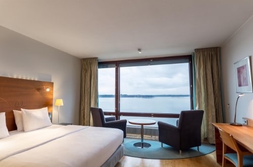 Sea view double room at Hilton Helsinki Kalastajatorppa Hotel in Finland. Travel with World Lifetime Journeys