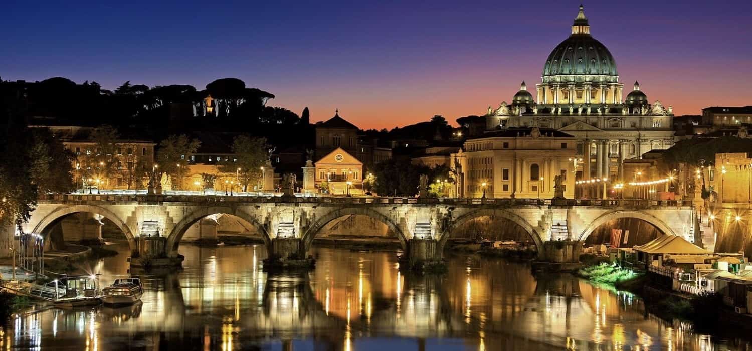 St. Peter's Basilica and Sant Angelo bridge in Rome, Italy. Travel with World Lifetime Journeys