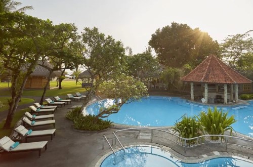 Swimming pool at Sol Beach House Benoa. Travel with World Lifetime Journeys in Bali, Indonesia