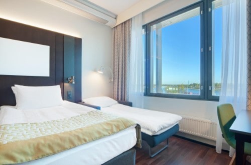 Triple room at The Holiday Inn Helsinki West in Finland. Travel with World Lifetime Journeys