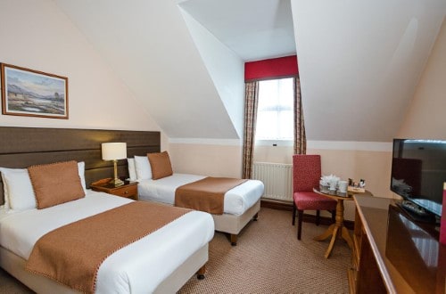 Twin room at Sheldon Park Hotel in Dublin, Ireland. Travel with World Lifetime Journeys