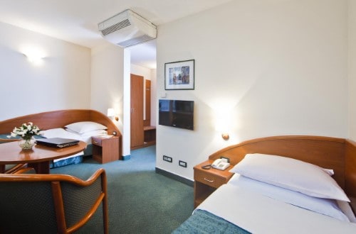 Twin room at Hotel Central in Zagreb, Croatia. Travel with World Lifetime Journeys