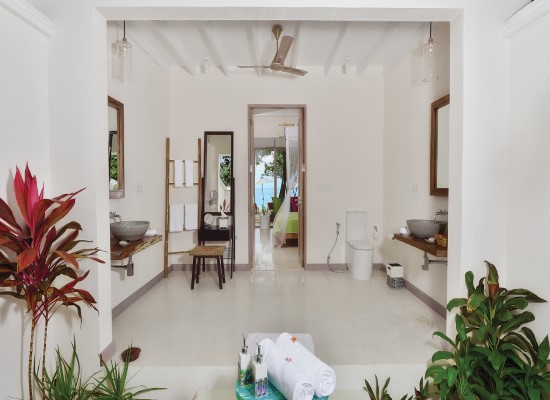 Deluxe bathroom at OBLU Atmosphere Helengeli Maldives. Travel with World Lifetime Journeys