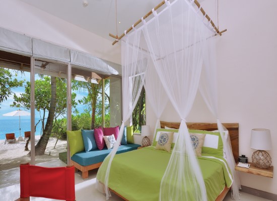 Deluxe beach villas at OBLU Atmosphere Helengeli Maldives. Travel with World Lifetime Journeys