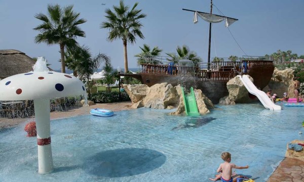 Summer family beach holiday Cyprus Aquamare beach hotel and spa Cyprus. Travel with World Lifetime Journeys